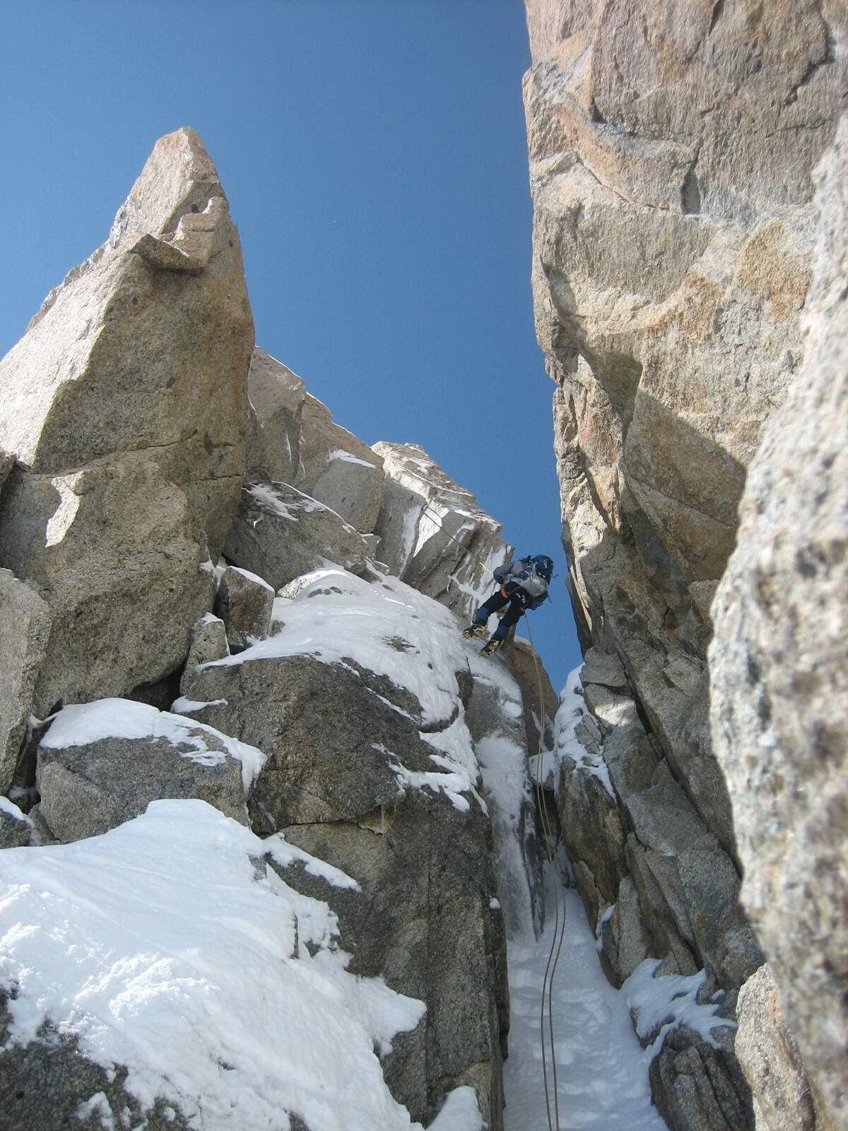 Rappels on the Arete des Cosmiques, Chamonix, Mont Blanc.