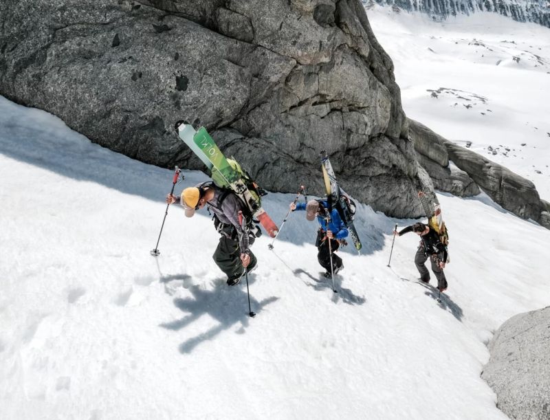 Skiers climbing up a couloir on the Ski mountaineering course
