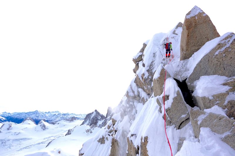 Advanced winter mountaineering training in challenging alpine conditions.