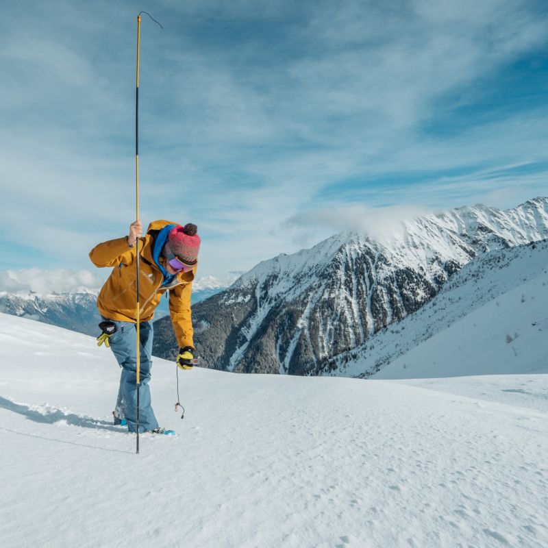 Pete mason teaching in field on the Chamex avalanche safety course