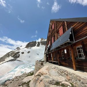 View of a high mountain refuge passing by on the Haute Route glacier trek.