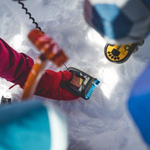 Group receiving avalanche safety training in Chamonix backcountry